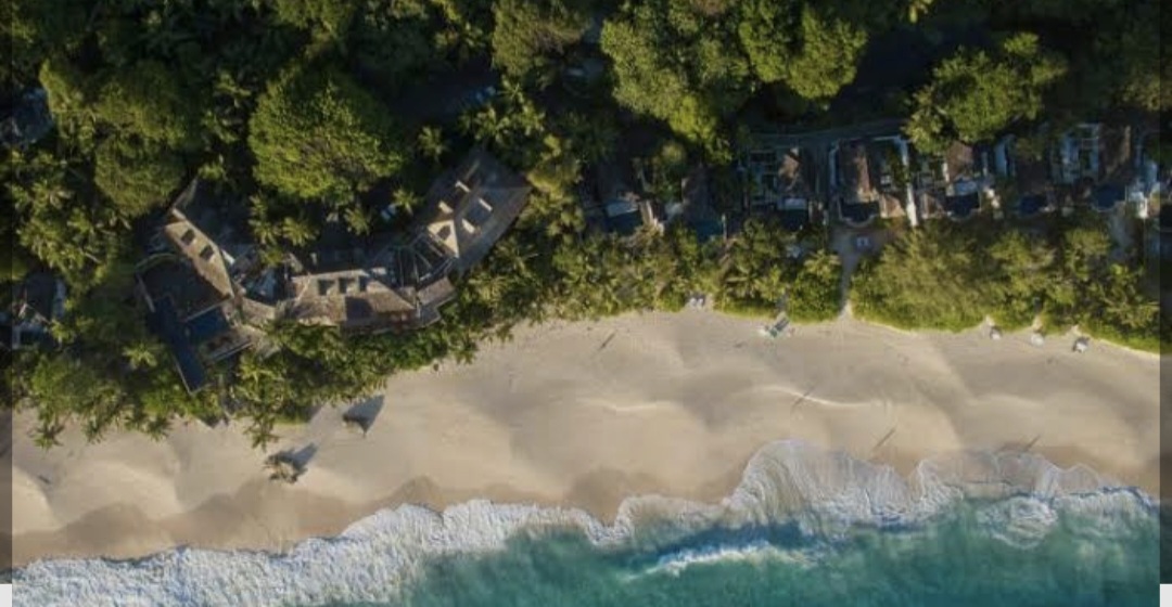 Aerial view of Anse Intendance beach, turquoise water and white sand on Mahé