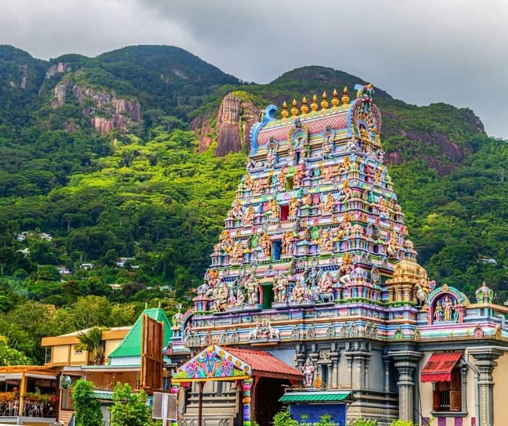 Carved and painted gopuram tower of the Hindu temple in Victoria, Mahé