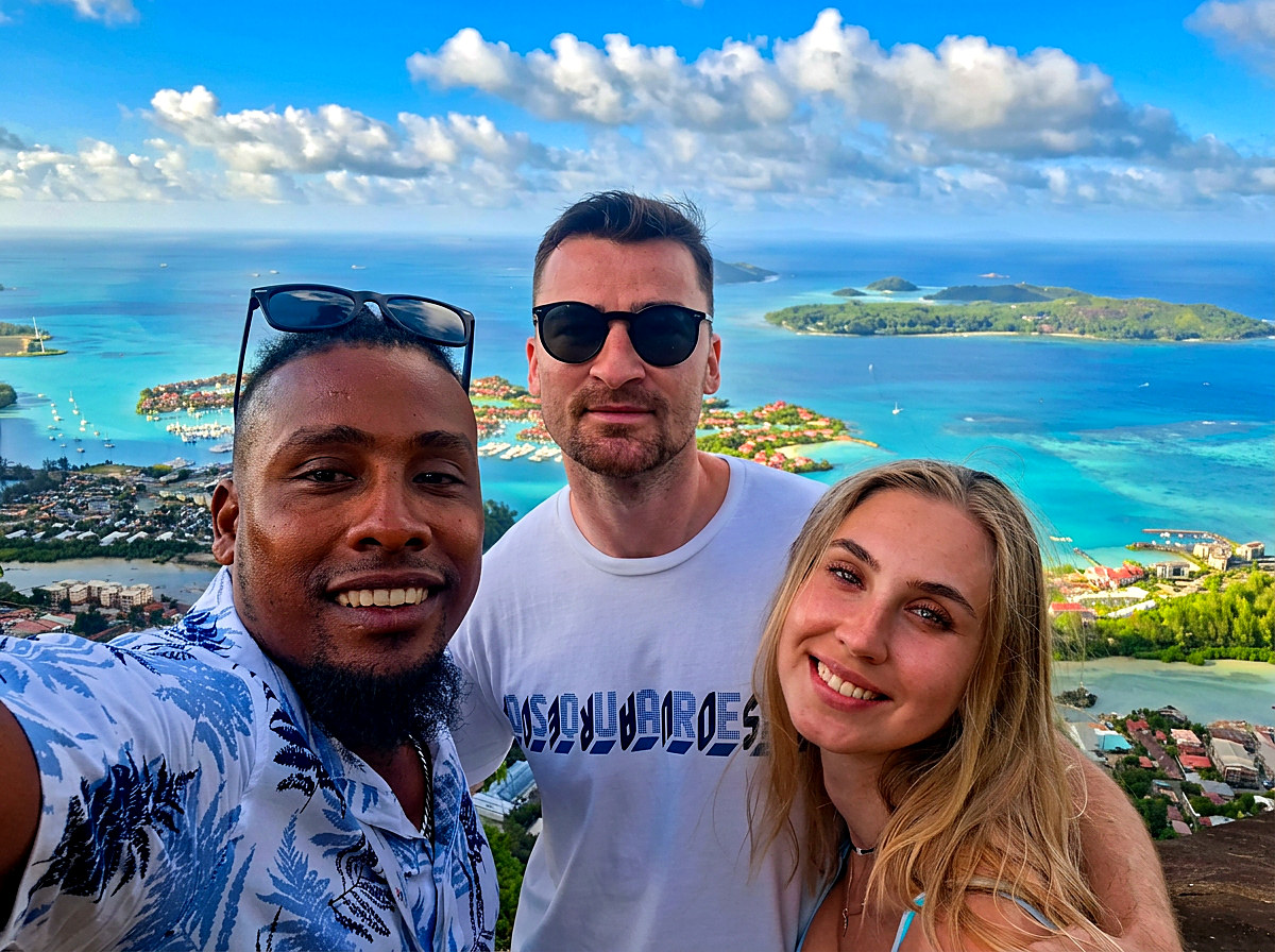 Vel with guests at a viewpoint above Eden Island, Mahé